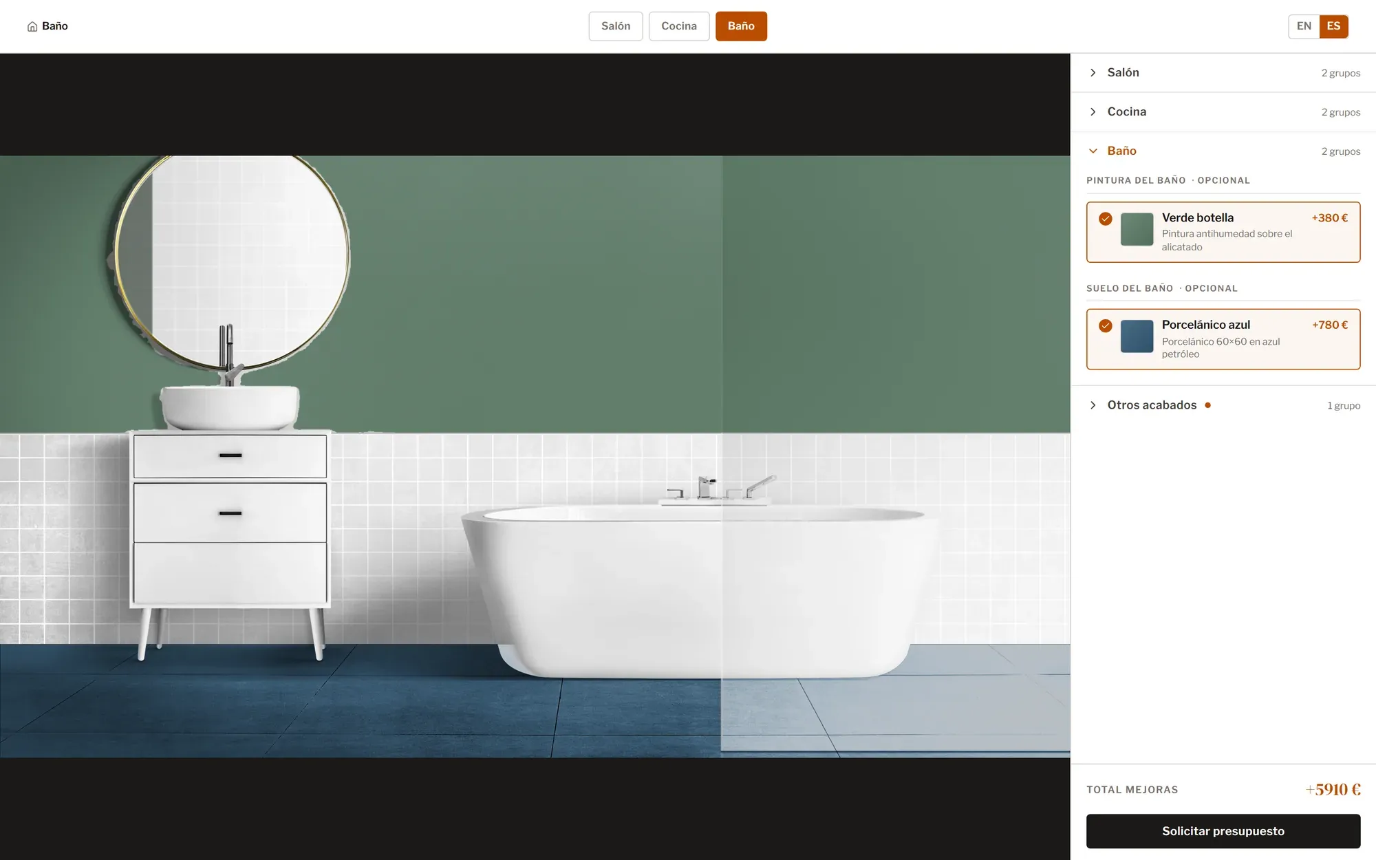 El baño con la pared en verde botella y el suelo de porcelánico azul.